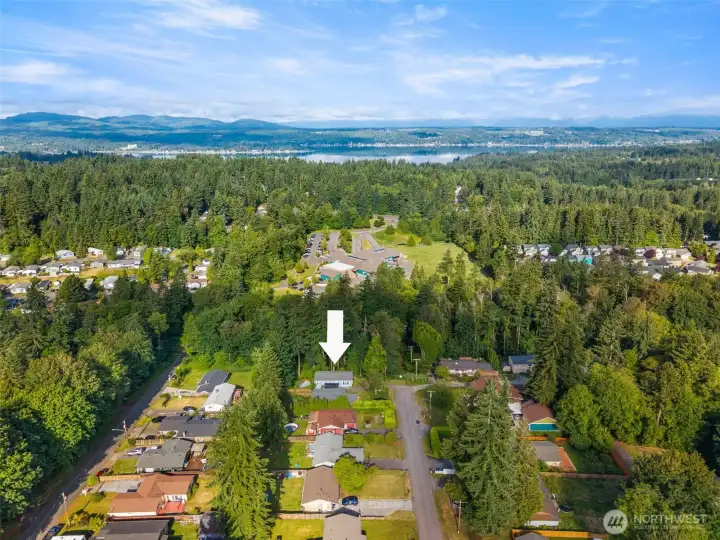 You get the best mix of all your wants right here: forested privacy behind the home, Dyes Inlet and Olympic Mountain views nearby, and a location that makes shopping, dining, and commuting so easy.