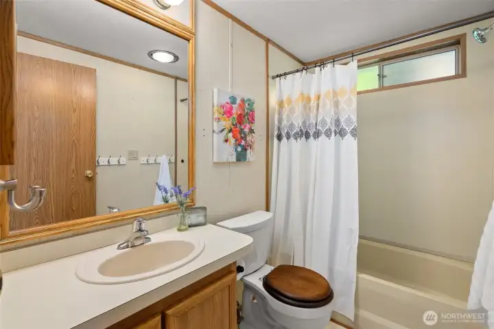 Having a second full bathroom is such a practical win, and this main hall bath gives you clean, easy function right where you need it.