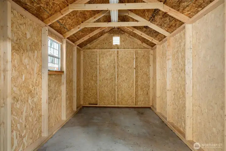 Inside the new shed, everything is clean, dry, and ready for the overflow: tools, garden gear, seasonal décor, or all the things that deserve a spot of their own.