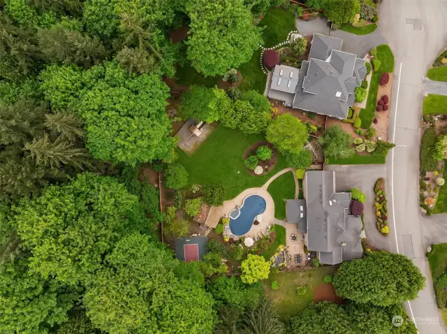 This stunning home is surrounded by greenbelt-tons of privacy!