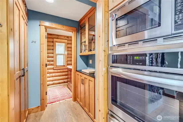 Butler pantry on the right, custom food pantry on the left, and the powder room in the background. Nice!