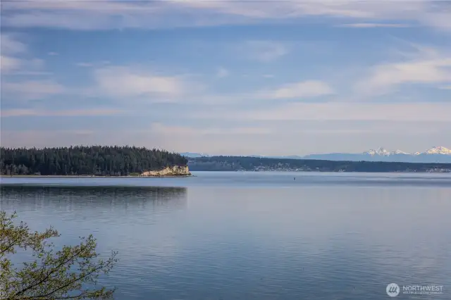 Enjoy stunning 180 degree views from this home of Marrowstone Is., Admiralty Inlet & the Cascade Mt. Range.