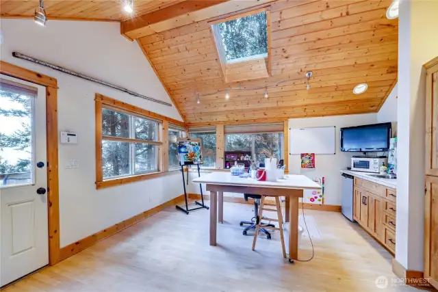 The apartment above the garage is 816 sq ft, with mini-fridge, microwave, sink, 1-bdrm large and a full bath!