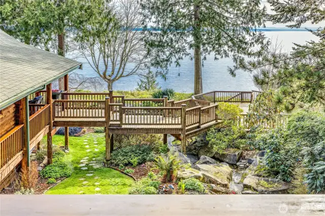 The view from the Studio deck, overlooking the waterfall on the right and the sparkling waters of Puget Sound.