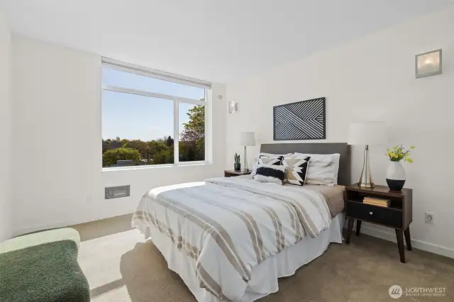 Bright and sunny east facing primary bedroom