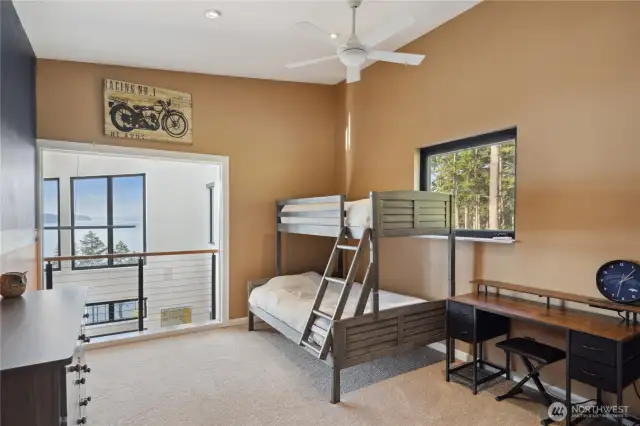 Loft office or additional bedroom on upper level over looking the living room.  Slider opaque doors can close off the room