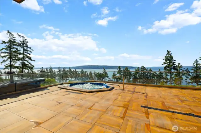 My, ohhh my!  You said you wanted a getaway retreat on an island.  Tiled patio with built in hot tub.