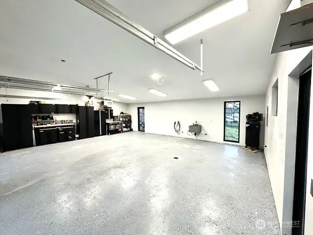 Over 800’ Garage with custom cabinetry