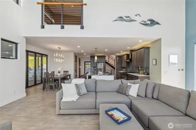 Open layout from kitchen to living room and outdoor covered patio