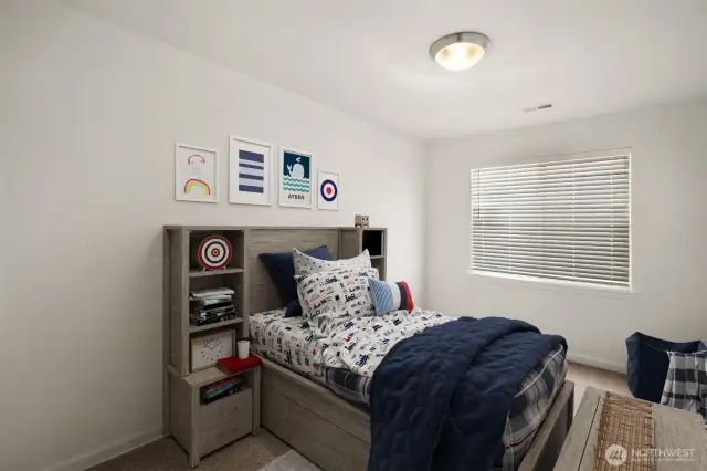 bedroom 2 at top of stairs w/walk-in closet