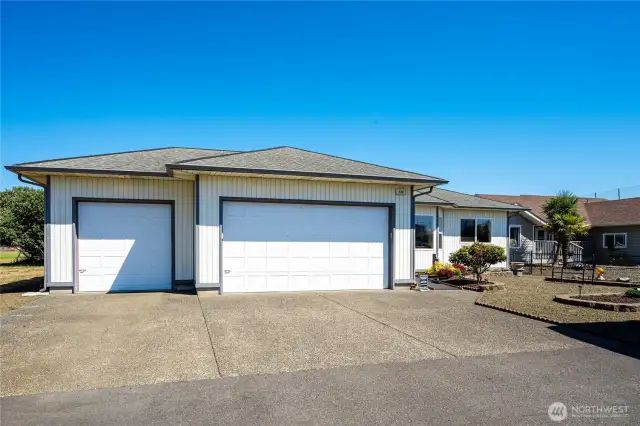 2.5 car garage! Parking for your golf cart with door to fenced back yard!
