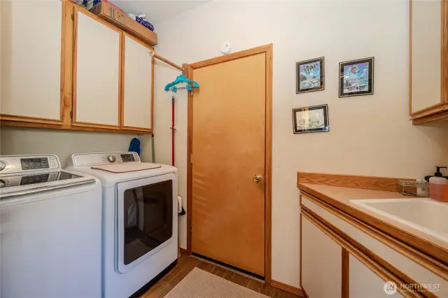 The laundry room is off the kitchen with garage access.