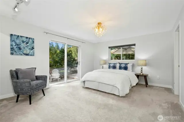 Primary bedroom with private backyard deck