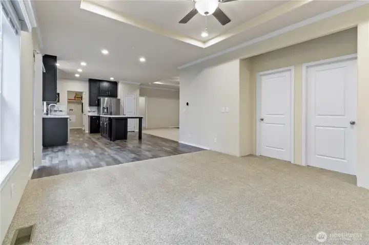 Fam room looking back to kitchen/ 2 bedrooms on right