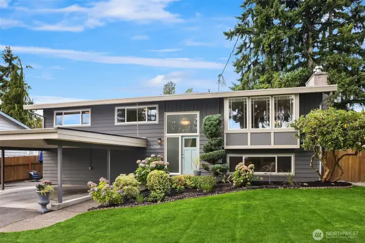 Welcome home! Located in the heart of it all - walk to the light rail, local library, swimming pool at the Lynnwood Recreation Center, shopping at Nordstrom and more. This stunning house is sure to delight with updates and designer touches at every turn. Gorgeous and level front and back yard, garden shed with power and light, RV parking, and MIL unit with 2nd kitchen. Rare and impeccable find.