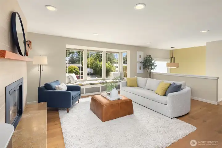 Painted throughout with designer colors and styling, engineered hardwood floors, spacious and bright.