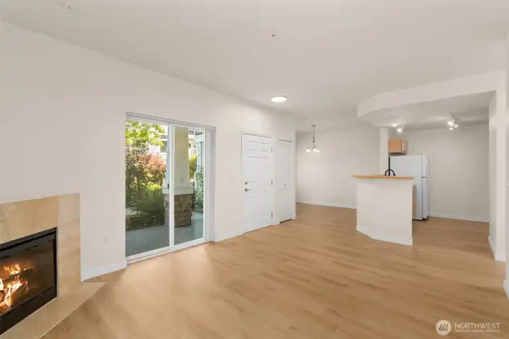 Corner fireplace, slider leads out to patio