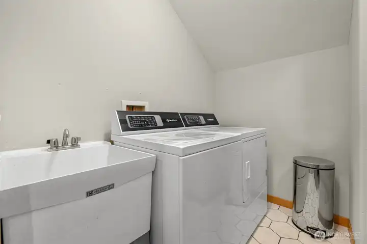Utility room with heated tile floors