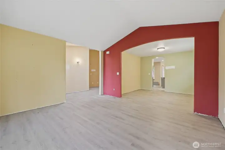 Living room open to dining room.