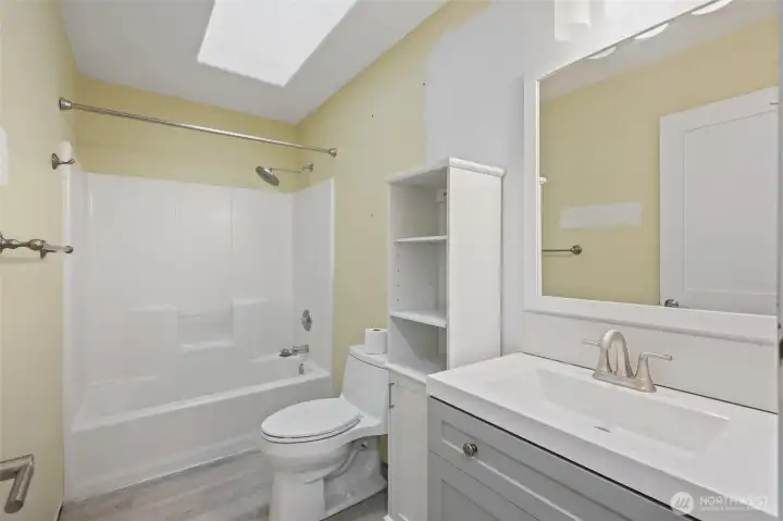 Guest bathroom with skylight.