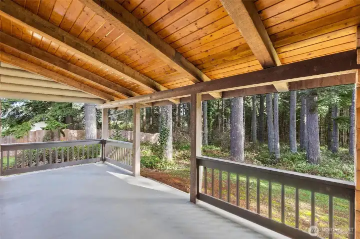 Relax and unwind on the covered front porch — the perfect place to watch nature, listen to the breeze through the trees, and savor quiet country moments.