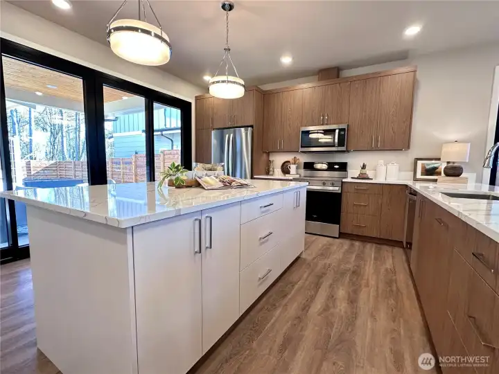 Dual tone kitchen cabinets in a functional layout.