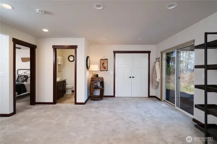 Lower level with laundry space + access to office + 3/4 bath with shower + outdoor covered patio