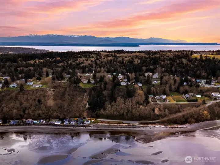 Nestled between the Cascades + Olympic mountains -- this home sits in an easily commutable neighborhood on Whidbey Island