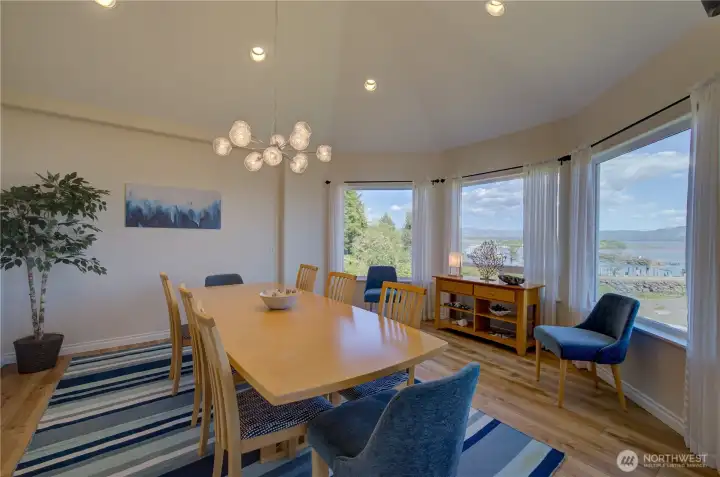 DINING ROOM WITH BAY VIEW FROM EVERY ANGLE