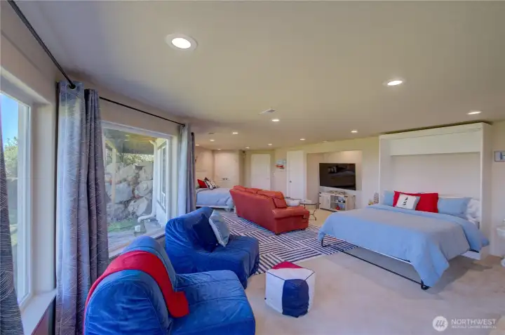 ANOTHER ANGLE FROM OPPOSITE END OF DOWNSTAIRS ROOM