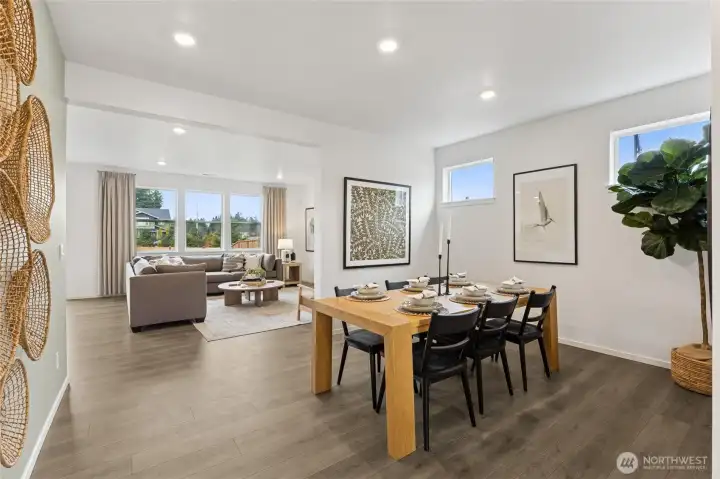 Dining area open to rest of the home and large enough for a huge table.   Pictures are for representational purposes only, colors and features may vary.