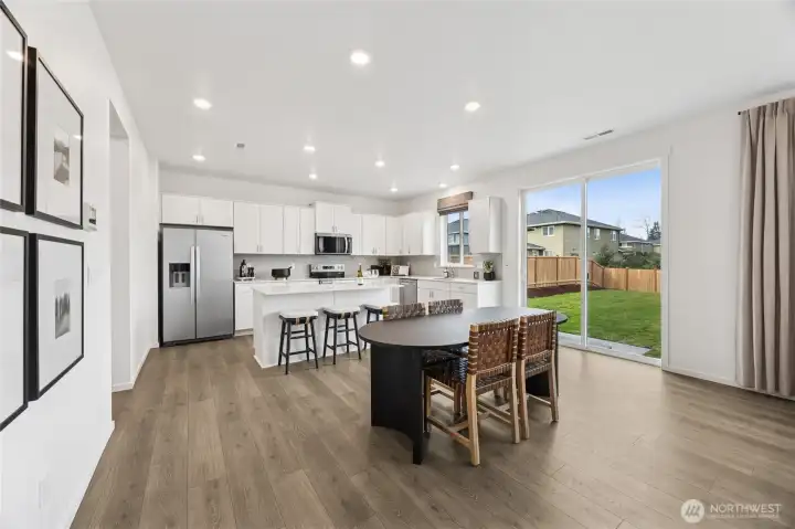 Space in kitchen area for an additional table.   Pictures are for representational purposes only, colors and features may vary.