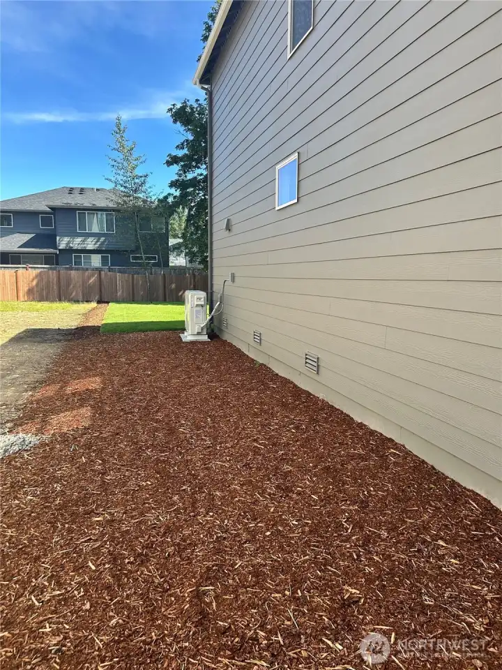 Spacious side yard for added shed space, dog run, or raised bed gardening. Spacious side yard for added shed space, dog run, or raised bed gardening.