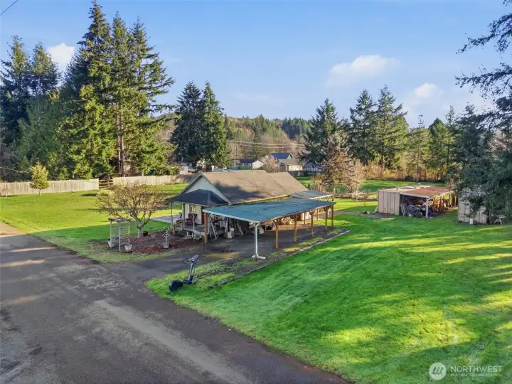 Offered vacant adjoining lot, home and included vacant lot with the patio.