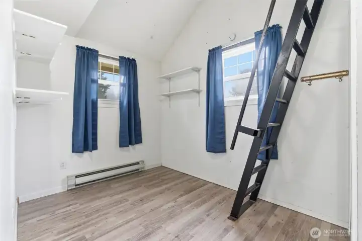 Bedroom #2 with stairs to loft