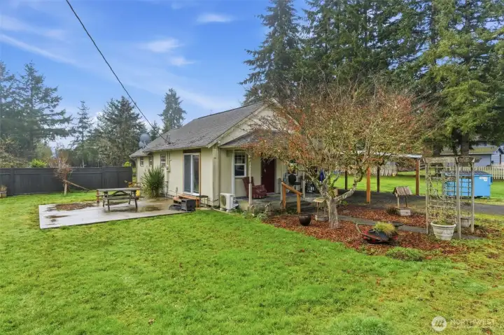 Landscaped entry to 403 Queen and hospitable front porch