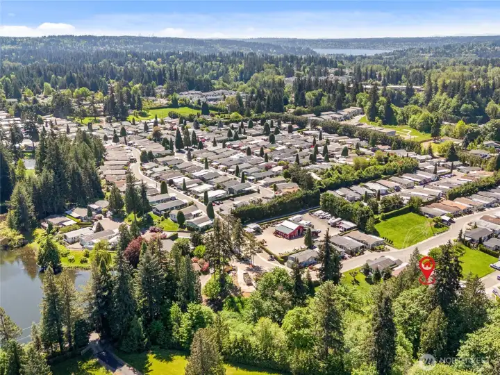 Aerial view shows many of the Parks amenities, dog park, car wash area, RV/boat storage,   "the barn" original to the property, where you can pick up free bark and other landscaping supplies.