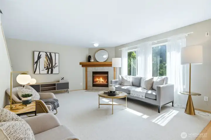 Bright family room filled with natural light and greenbelt views. surround sound and gas fireplace