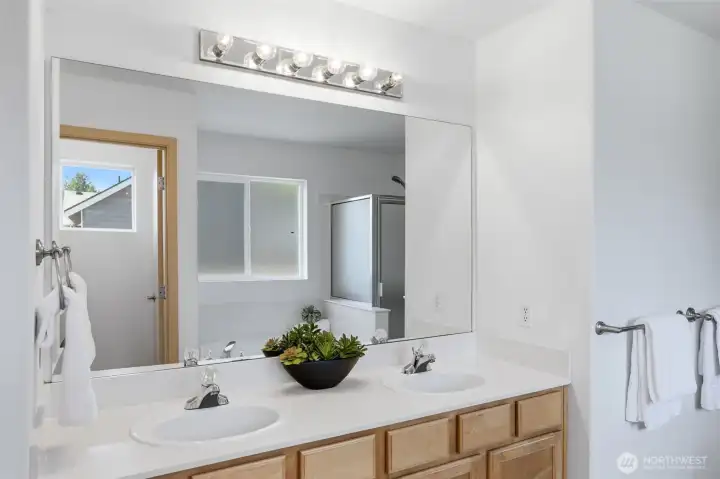 Primary bath with dual sink vanity.