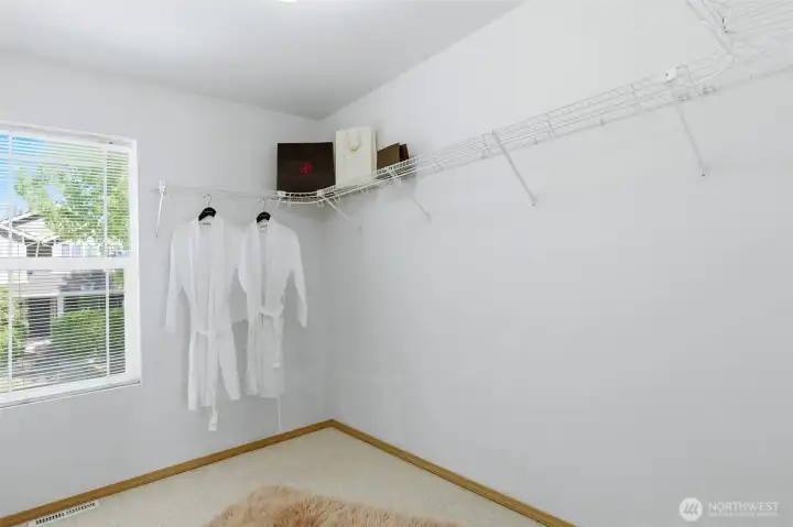 Primary walk-in closet.