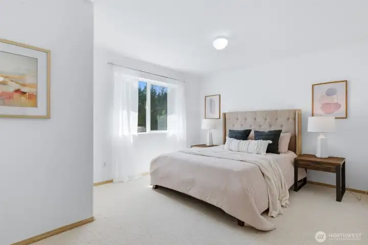Comfortable and inviting light-filled bedroom with gorgeous private serene views