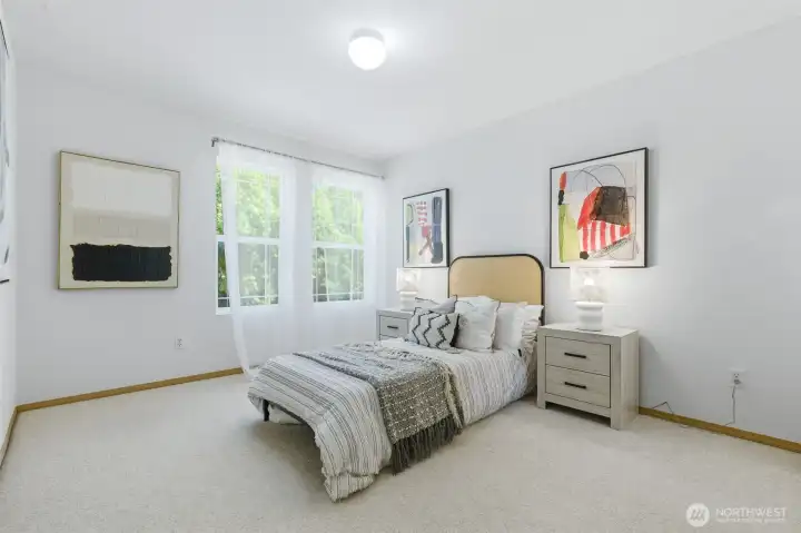 Spacious sunlit bedroom