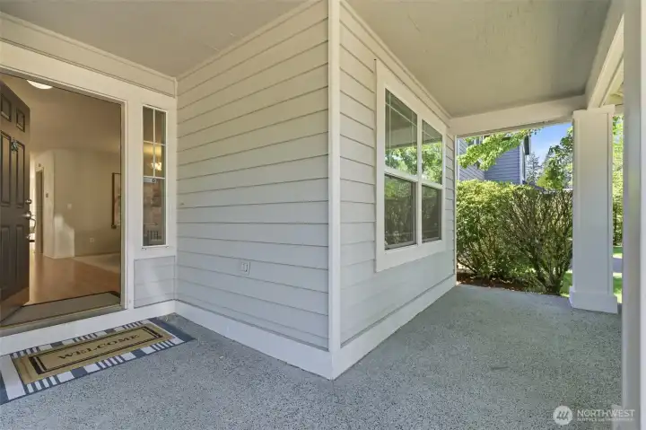 Inviting covered front porch perfect for relaxing outdoors.