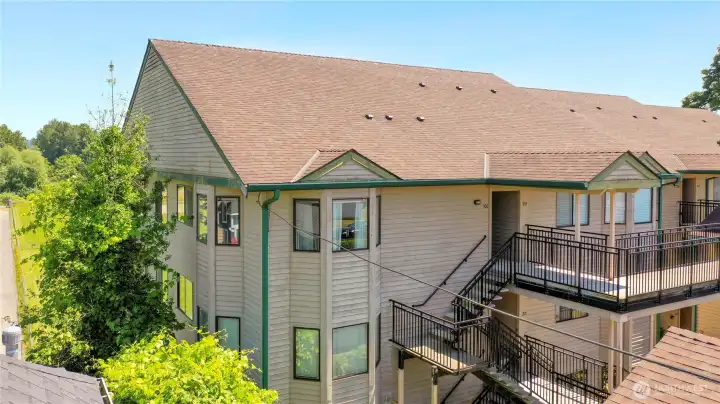 Natural light fills the home, creating a warm and welcoming atmosphere throughout. Step outside onto the expansive private balcony, the perfect place to enjoy your morning coffee, relax at the end of the day, and take in the peaceful surroundings. Community amenities include a large common green space, trail access to one of the Pilchuck River parks, elevator access in addition to stairs, covered parking, and a private storage area. Natural light fills the home, creating a warm and welcoming atmosphere throughout. Step outside onto the expansive private balcony, the perfect place to enjoy your morning coffee, relax at the end of the day, and take in the peaceful surroundings. Community amenities include a large common green space, trail access to one of the Pilchuck River parks, elevator access in addition to stairs, covered parking, and a private storage area.