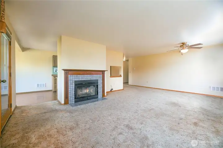 Living room dining room that is filled with natural light with all the windows. Living room dining room that is filled with natural light with all the windows.