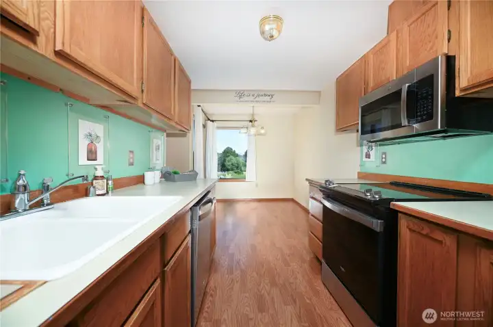Kitchen with eating nook. Kitchen with eating nook.