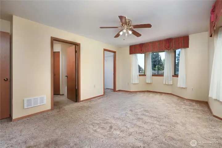 The generous primary suite features a walk-in closet and full ensuite bath The generous primary suite features a walk-in closet and full ensuite bath