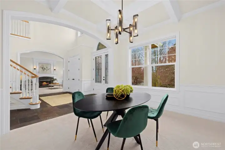 The formal dining room next to the grand stair. New paint, carpet and lighting.