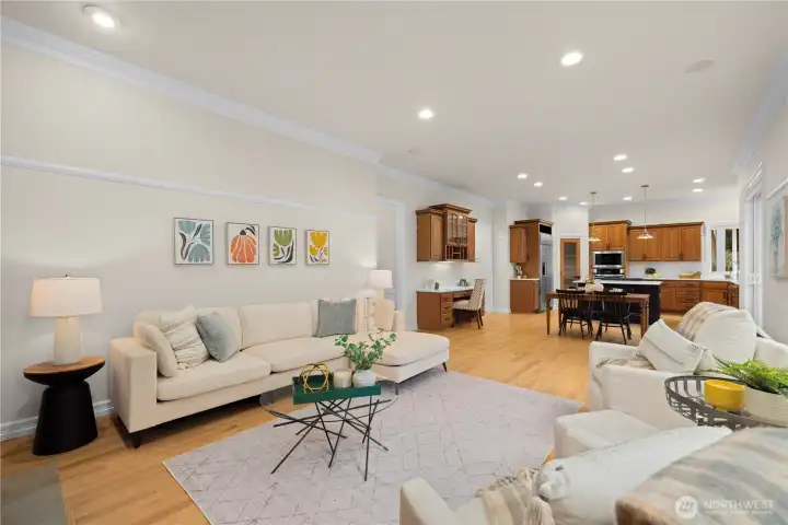 The living room has tons of natural light and is the perfect spot to lounge off the kitchen.