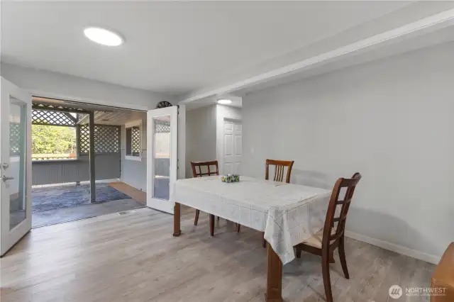 Spacious dining area with access to a covered patio.